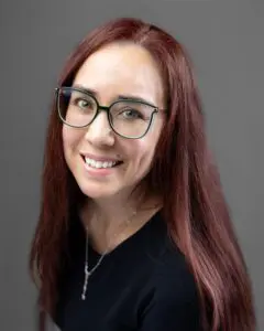 A headshot of Angel white
